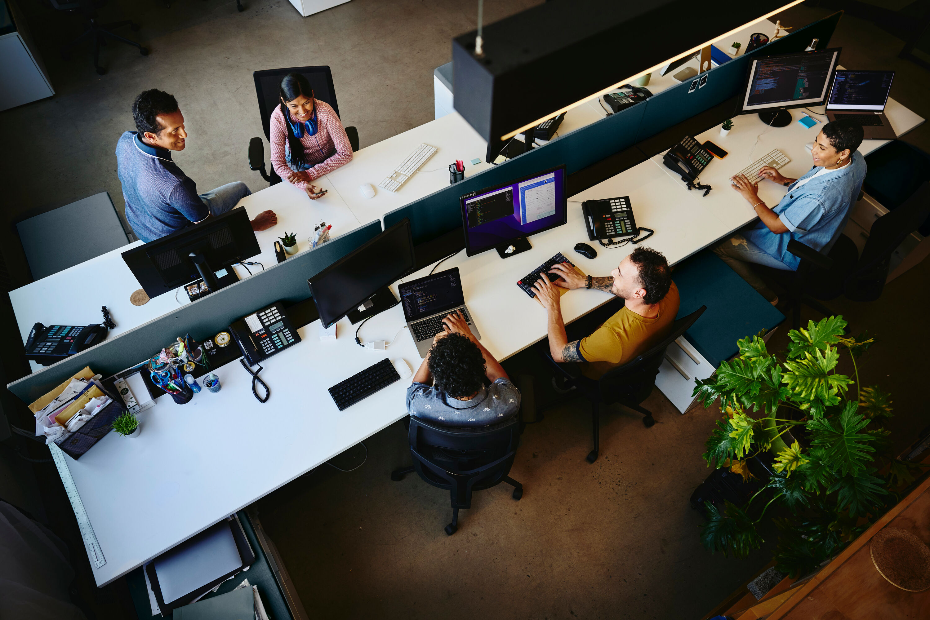 people working together at a desk