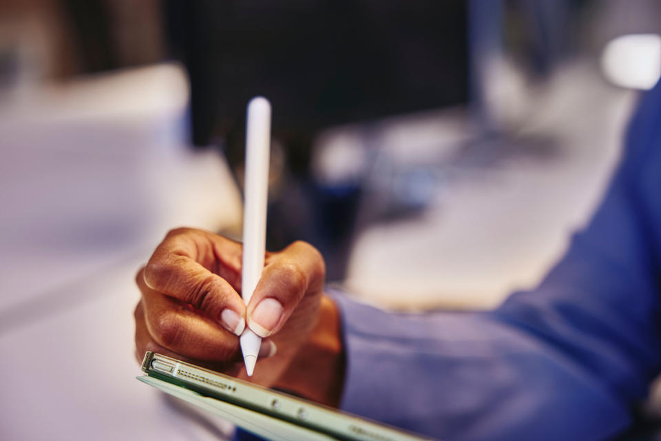 hand with tablet